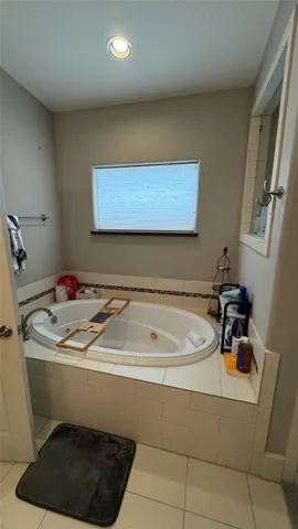 a bathroom with a sink a mirror and a toilet