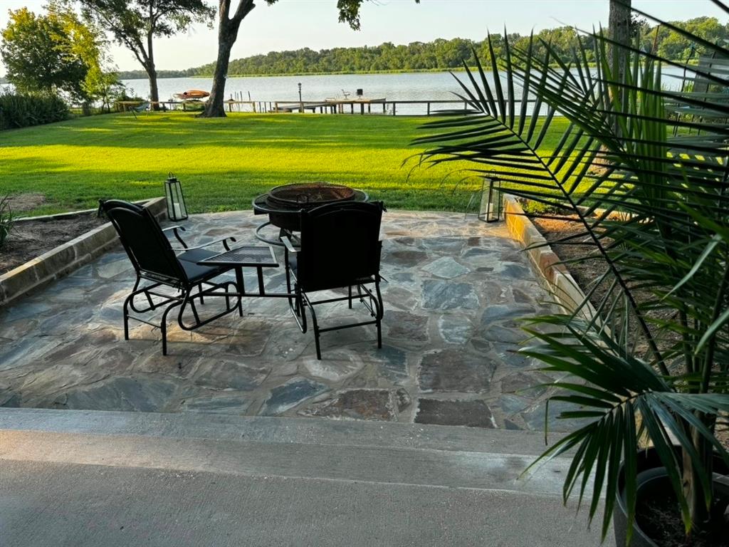298 Redbud A Mexia, TX 76667 - Photo 5 of 40 a view of a swimming pool and lounge chairs