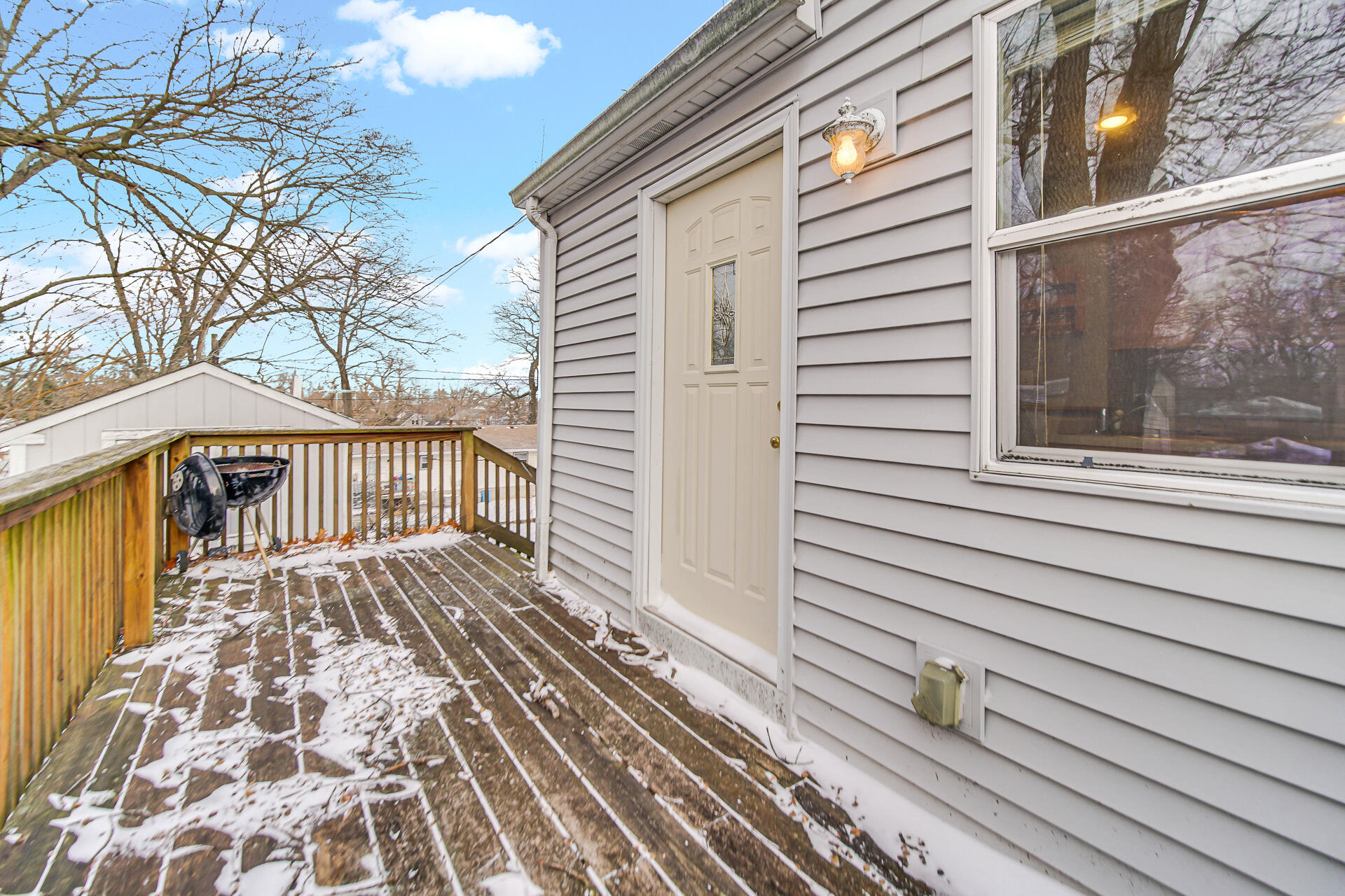 2228 Riverside Drive Lake Station, IN 46405 - Photo 18 of 22 a view of a balcony with wooden floor