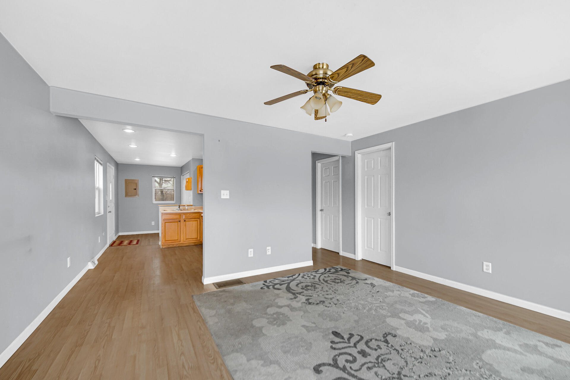 2228 Riverside Drive Lake Station, IN 46405 - Photo 2 of 22 a view of a livingroom with a ceiling fan