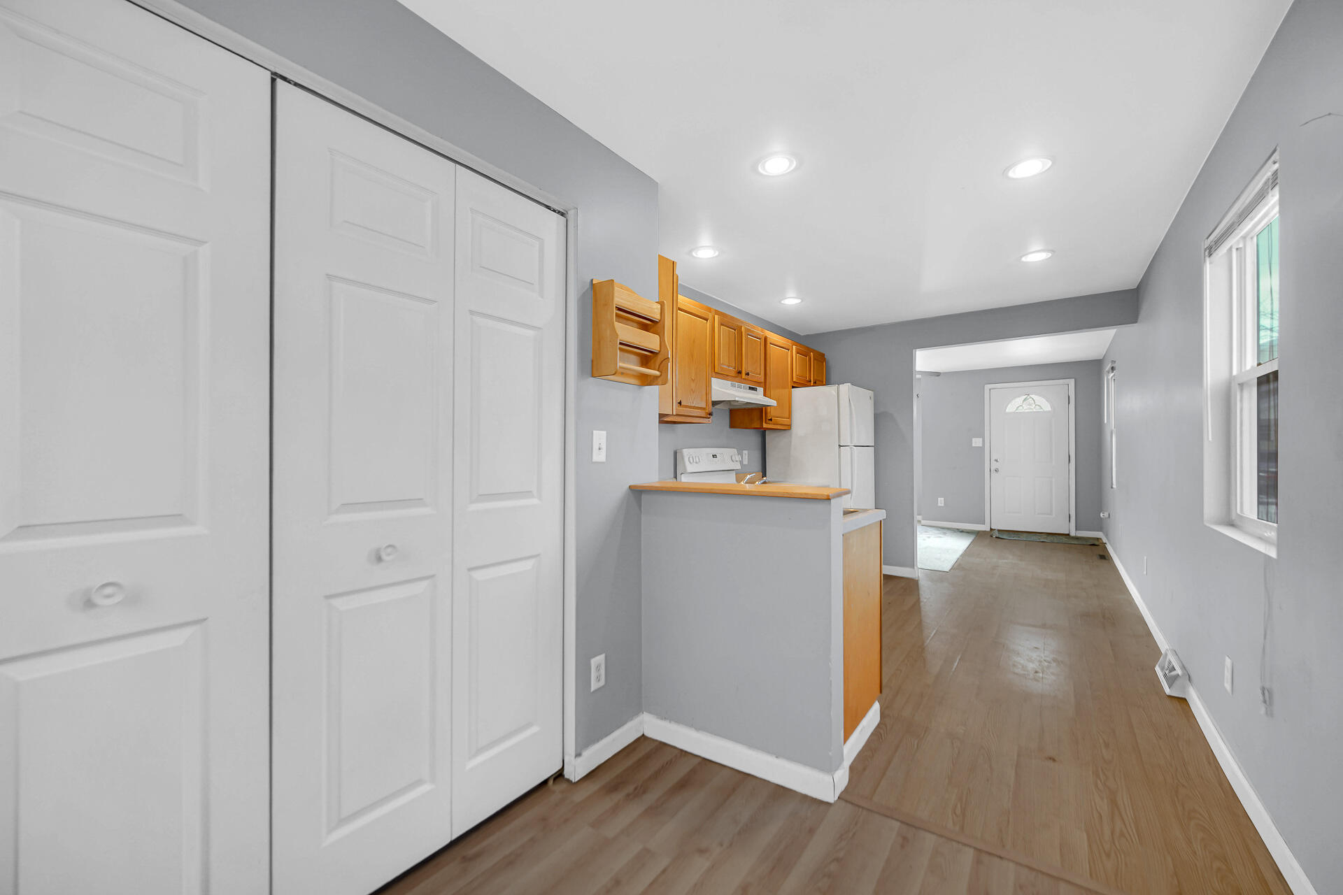 2228 Riverside Drive Lake Station, IN 46405 - Photo 4 of 22 a view of a hallway with wooden floor