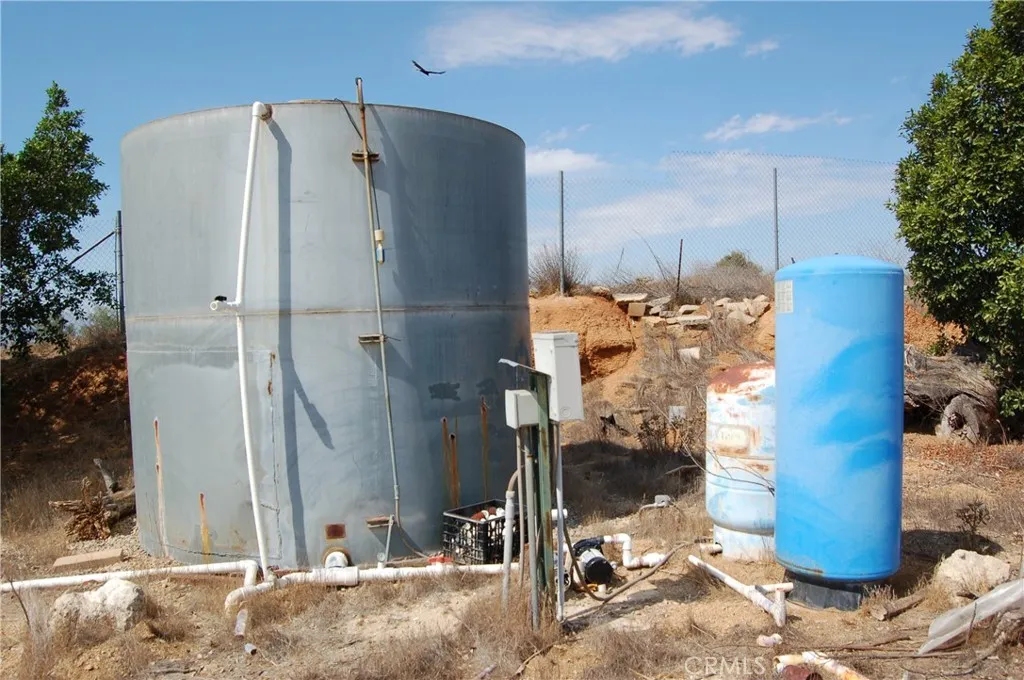 14350 Blackburn Lake Riverside, CA 92503 - Photo 35 of 36 a refrigerator freezer sitting in a yard