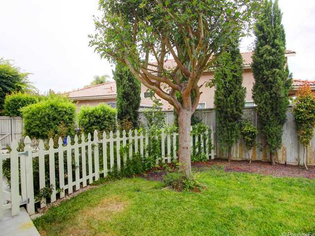 2100 Sun Valley Road San Marcos, CA 92078 - Photo 22 of 25 Dog enclosure between picket fence and side gate.