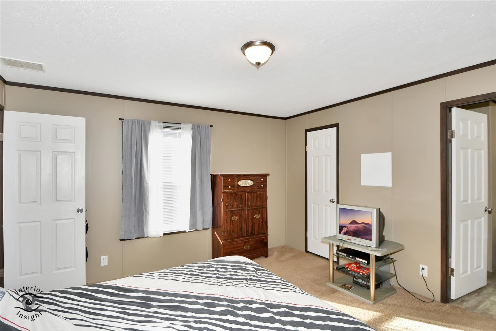 72 Apple Lane Bourbonnais, IL 60914 - Photo 12 of 23 a bedroom with a bed and a window