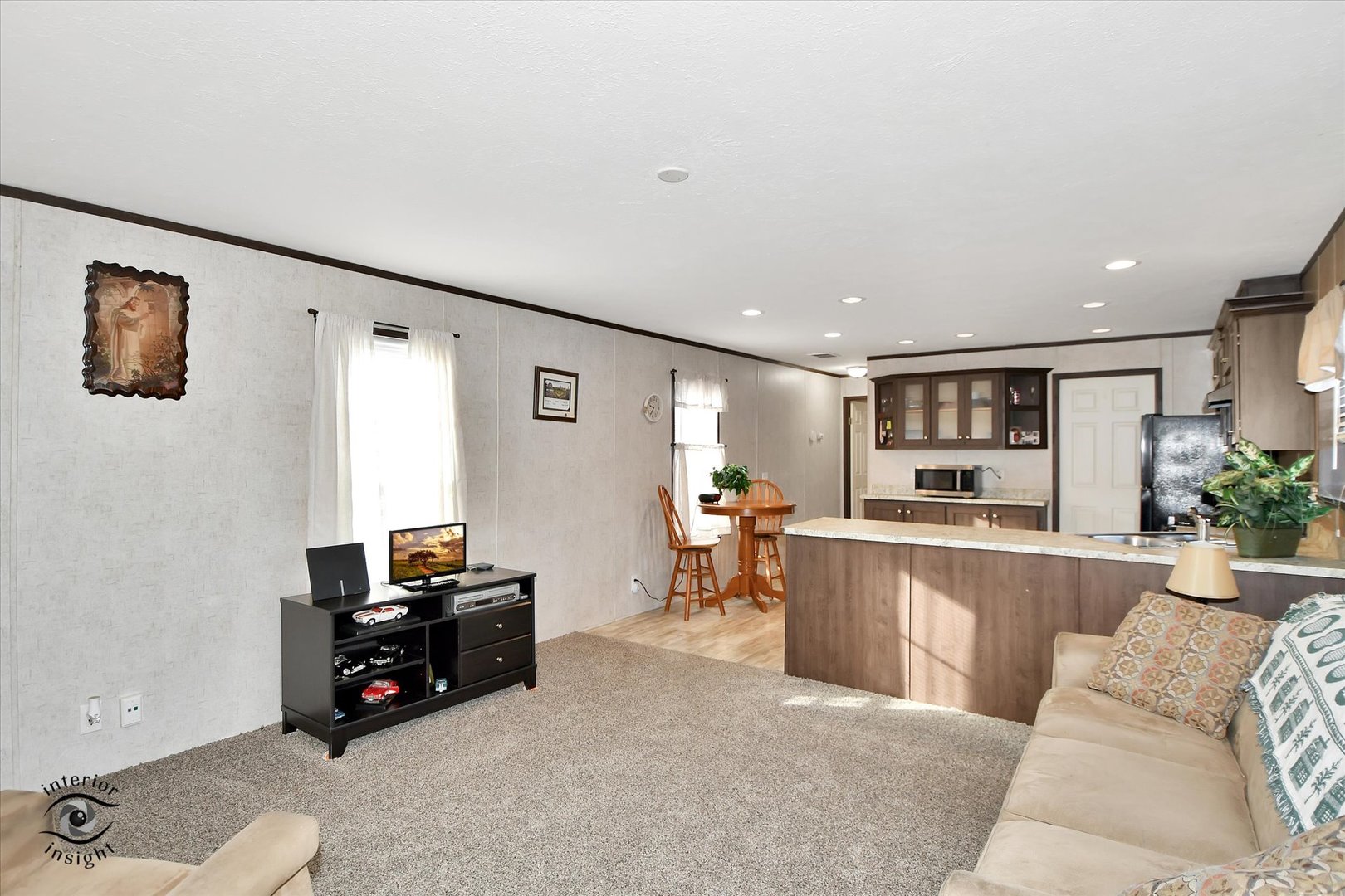 72 Apple Lane Bourbonnais, IL 60914 - Photo 4 of 23 a living room with furniture and a flat screen tv
