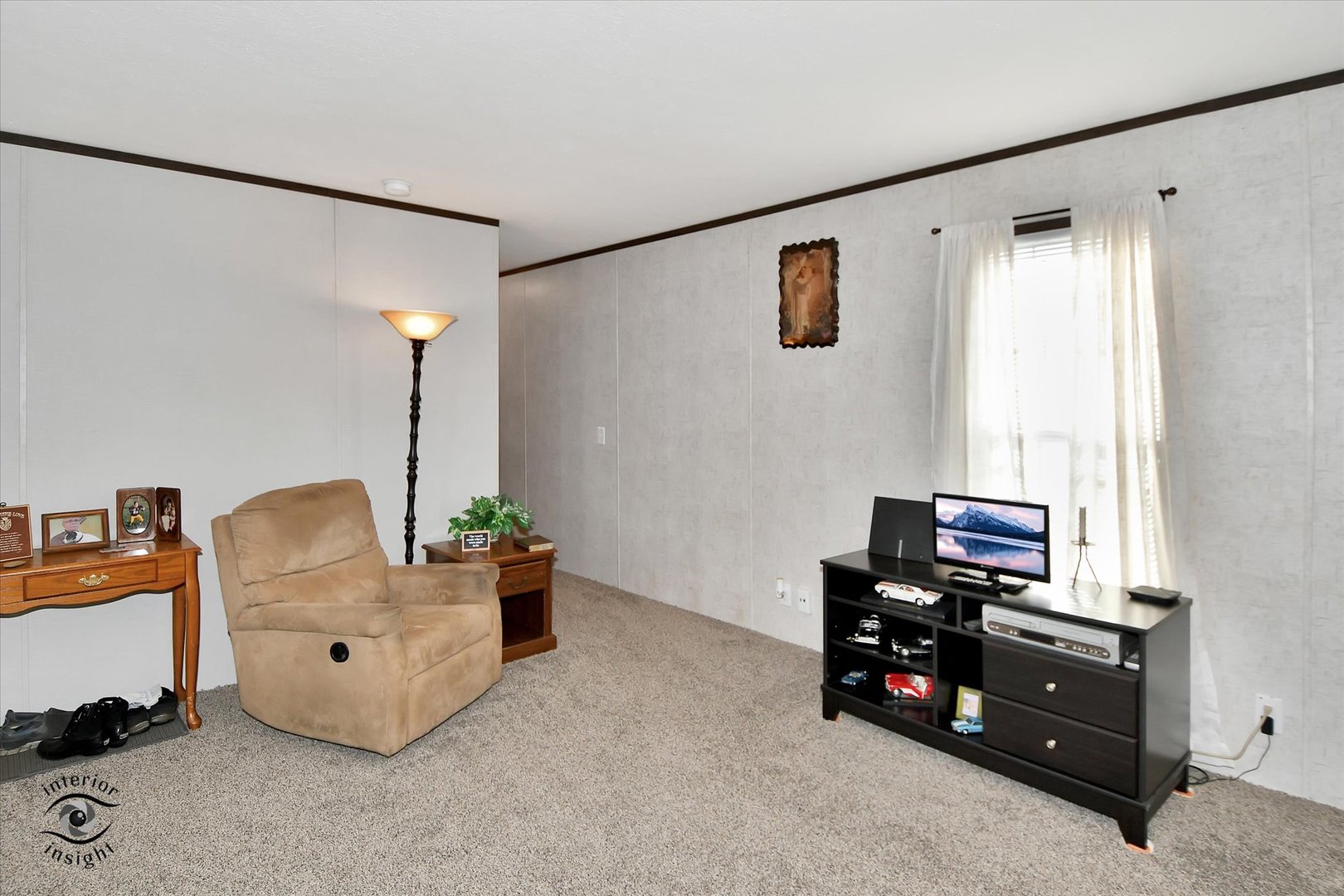 72 Apple Lane Bourbonnais, IL 60914 - Photo 5 of 23 a room with furniture and a flat screen tv