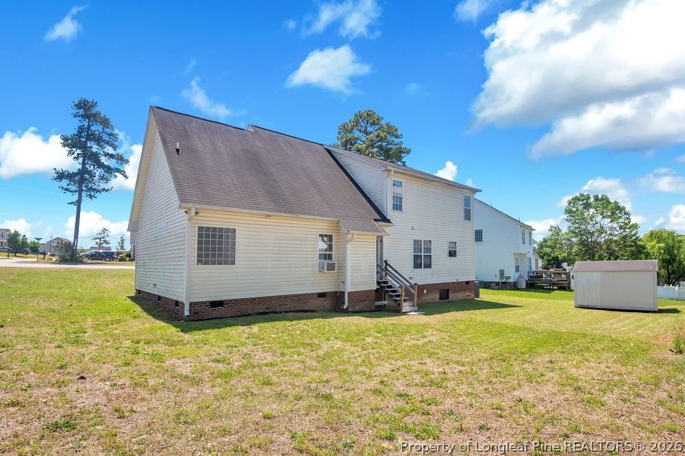 10 Pender Road Spring Lake, NC 28390 - Photo 28 of 35 a house view with a garden space