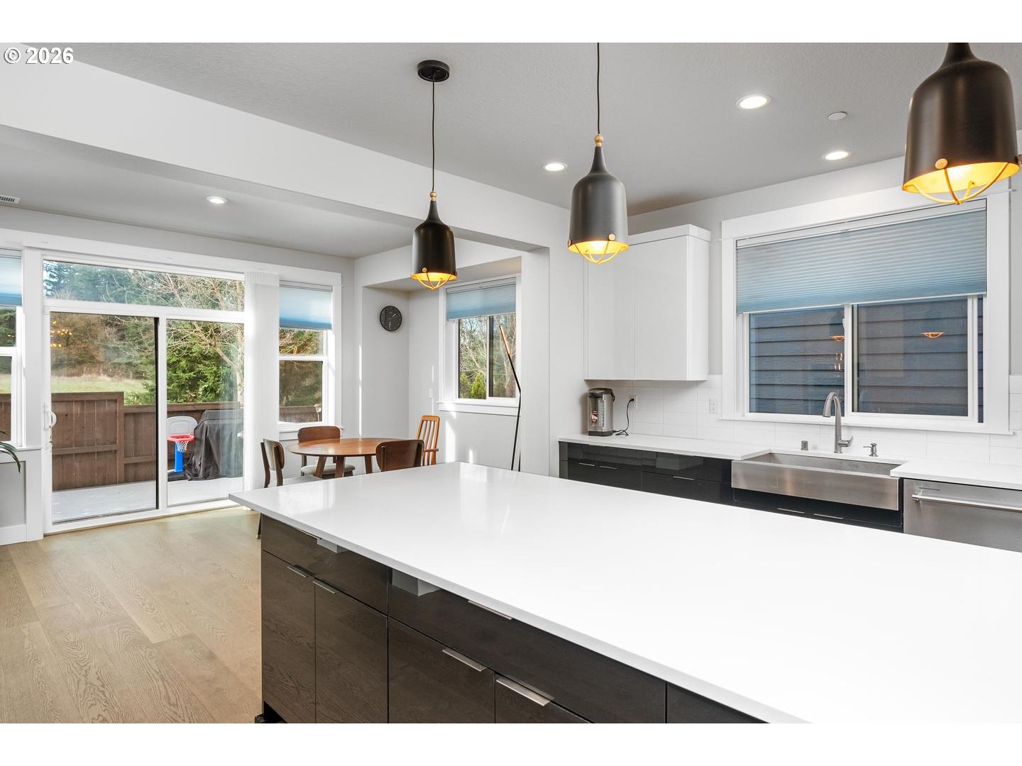 4010 Northwest 62nd Circle Camas, WA 98607 - Photo 11 of 46 a kitchen with stainless steel appliances a sink a counter space and a window