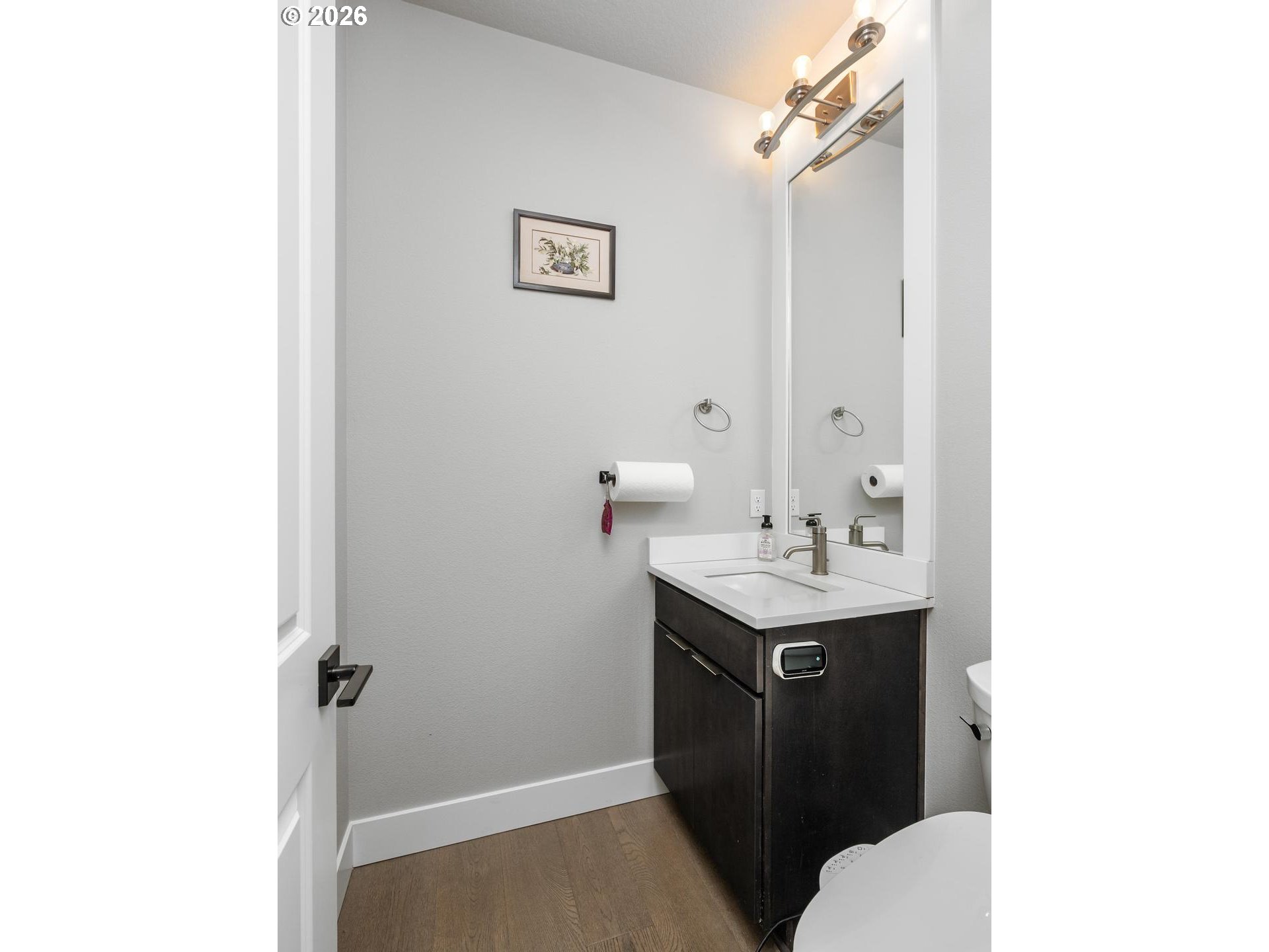 4010 Northwest 62nd Circle Camas, WA 98607 - Photo 16 of 46 a bathroom with a sink a toilet and mirror