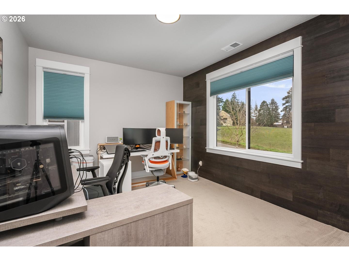 4010 Northwest 62nd Circle Camas, WA 98607 - Photo 24 of 46 a living room with furniture and a fireplace