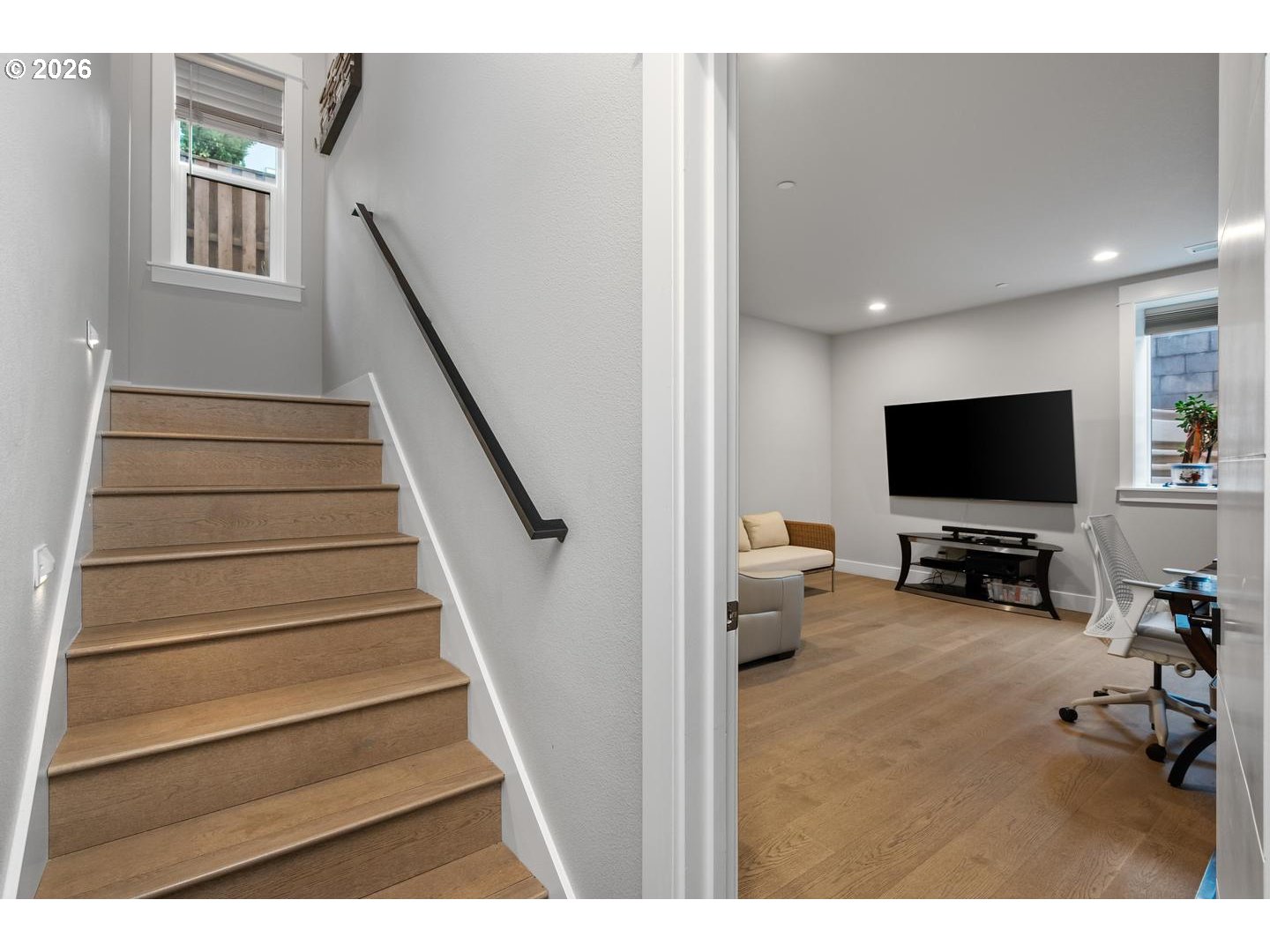 4010 Northwest 62nd Circle Camas, WA 98607 - Photo 27 of 46 a living room with furniture and a flat screen tv