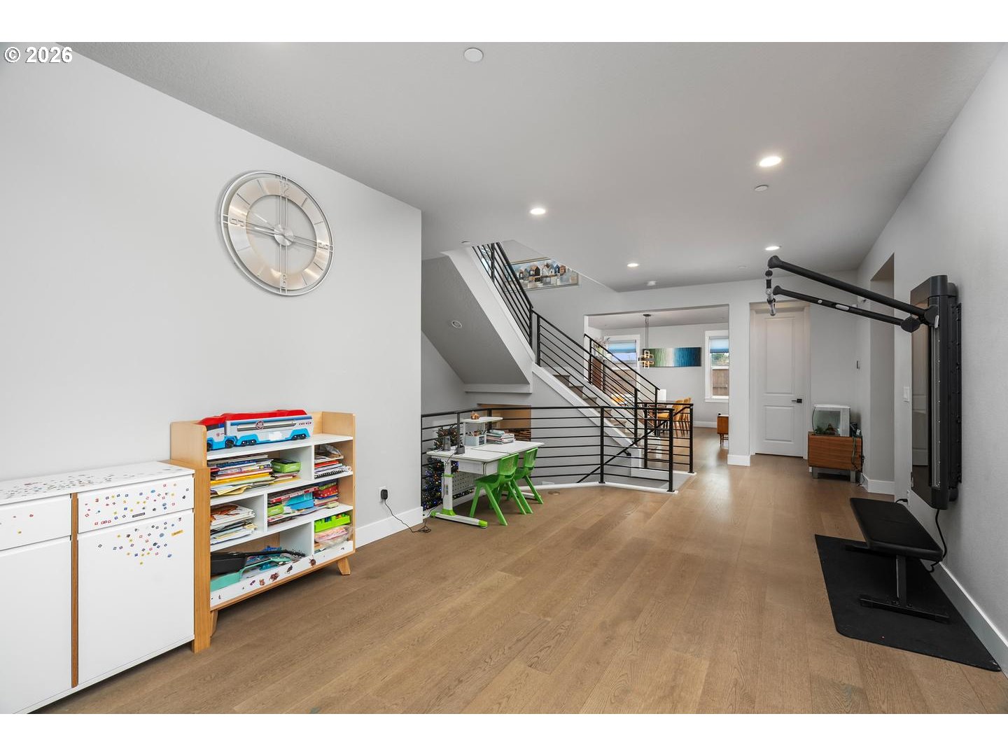 4010 Northwest 62nd Circle Camas, WA 98607 - Photo 34 of 46 a hallway with toys and wooden floor