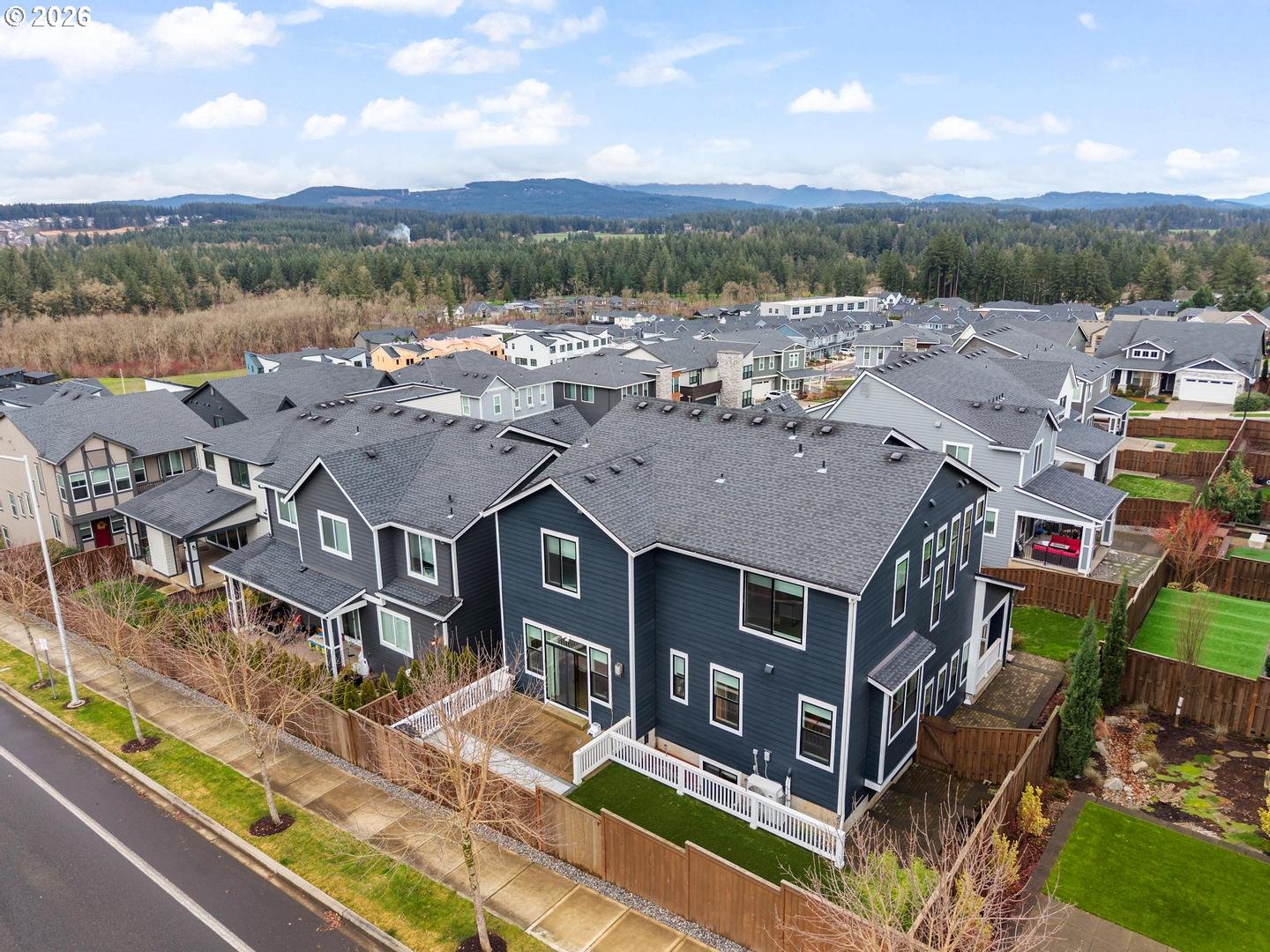 4010 Northwest 62nd Circle Camas, WA 98607 - Photo 41 of 46 a view of a house with pool and ocean view