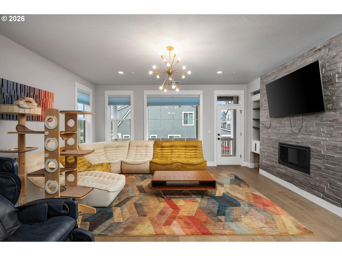 4010 Northwest 62nd Circle Camas, WA 98607 - Photo 5 of 46 a living room with fireplace furniture and a flat screen tv