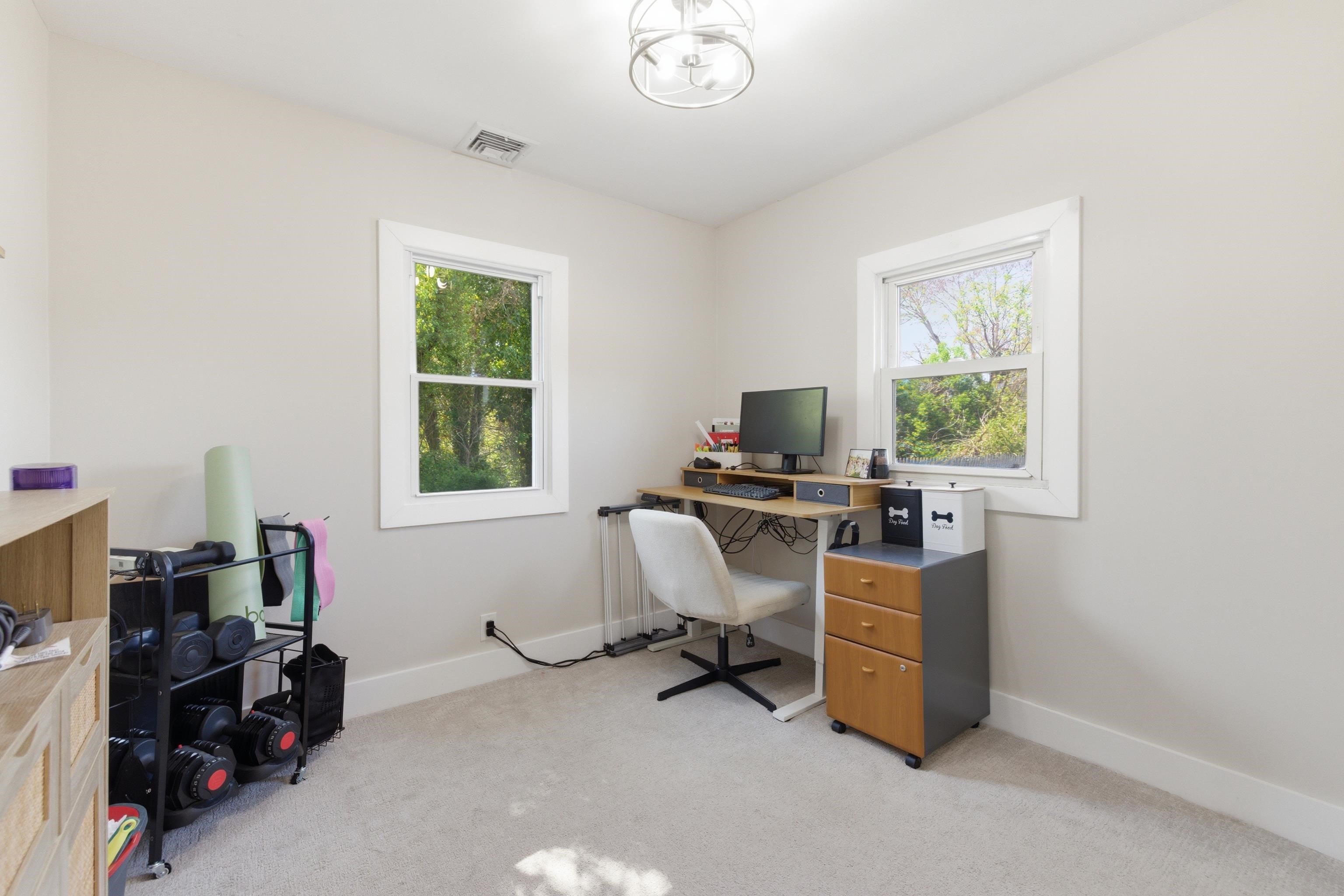 209 Breakwater Road North Cape May, NJ 08204 - Photo 21 of 40 a view of a workspace with furniture and a window