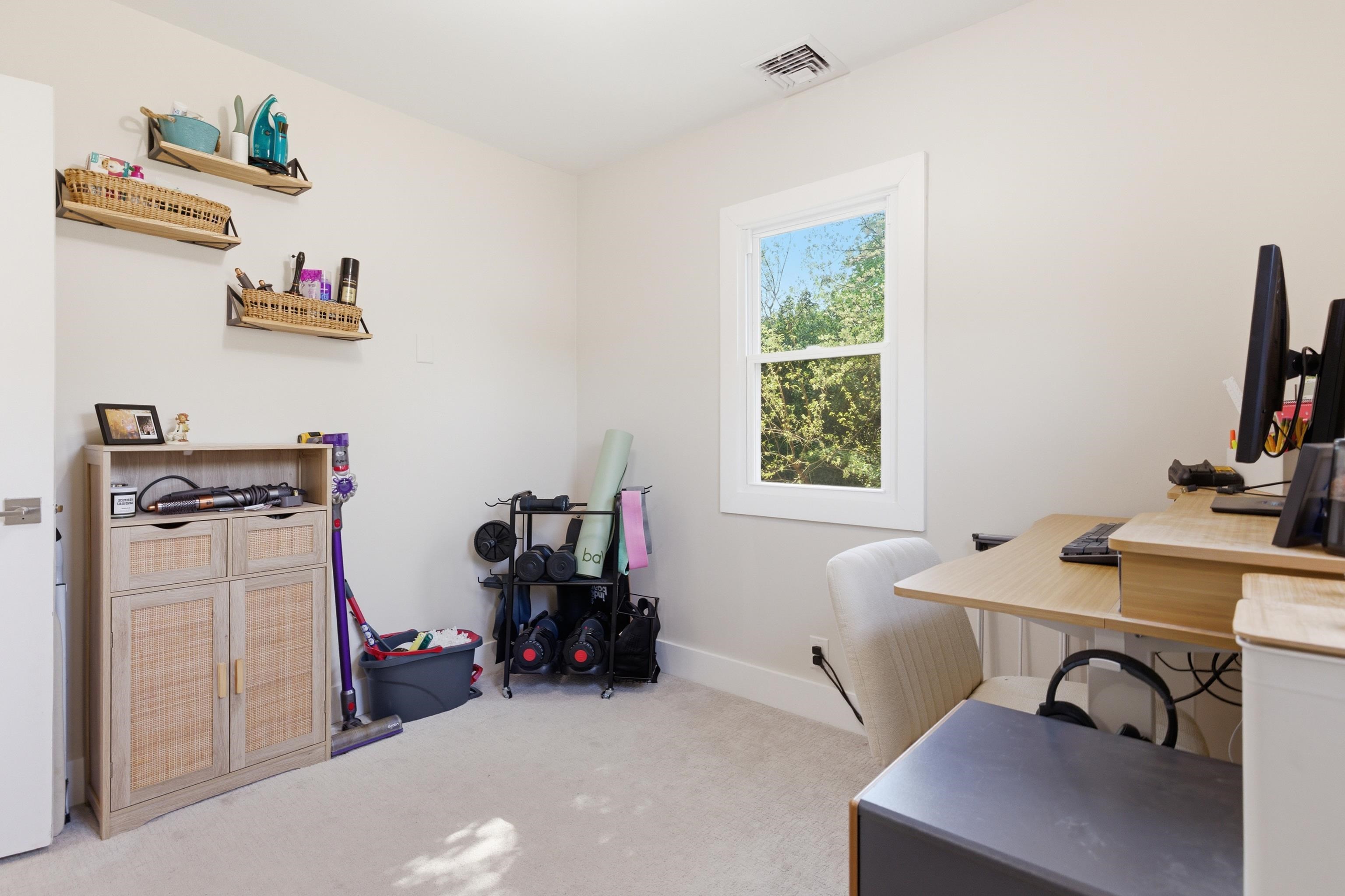 209 Breakwater Road North Cape May, NJ 08204 - Photo 23 of 40 a view of a workspace with furniture and a window