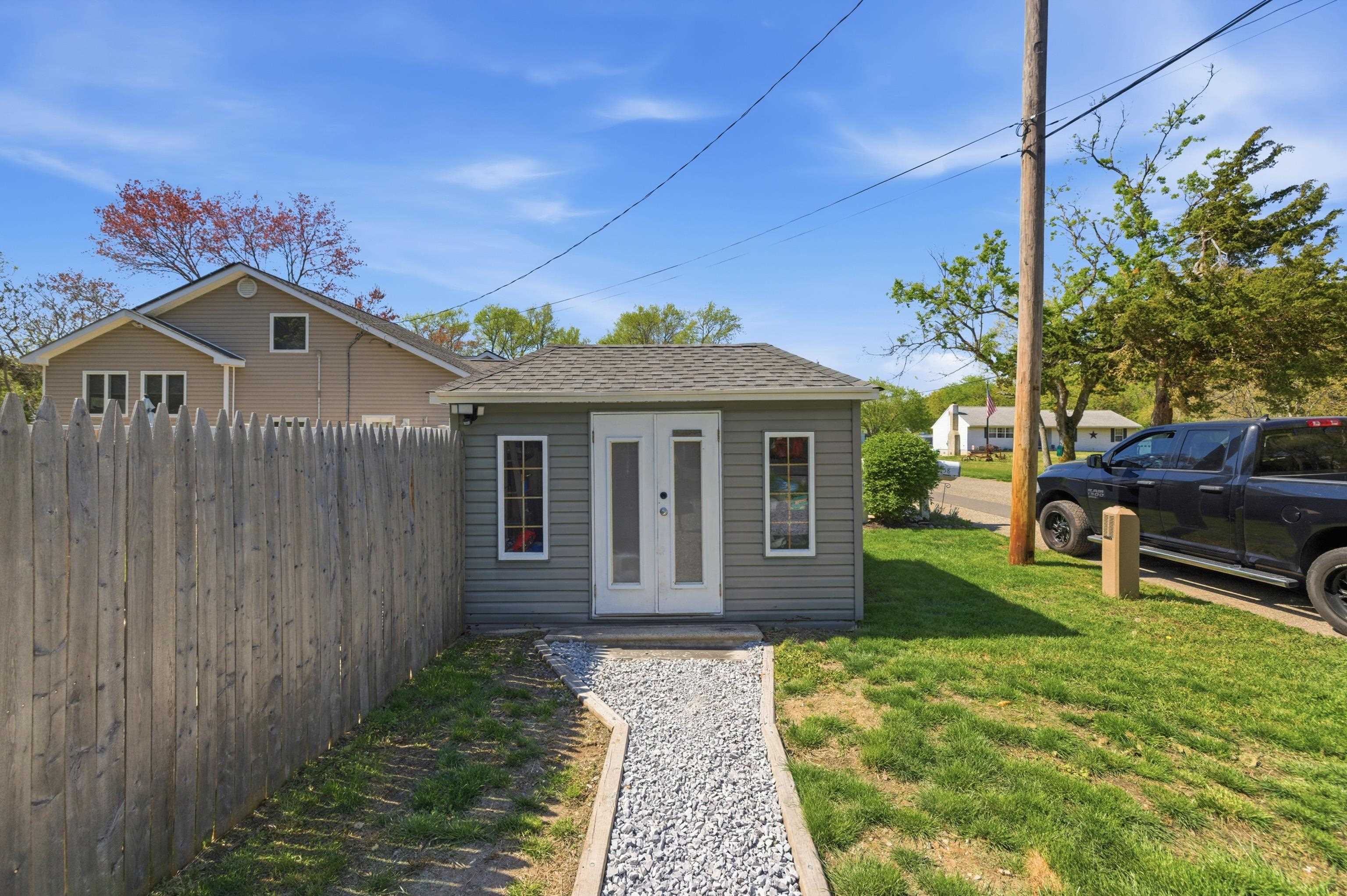 209 Breakwater Road North Cape May, NJ 08204 - Photo 24 of 40 a front view of a house with garden