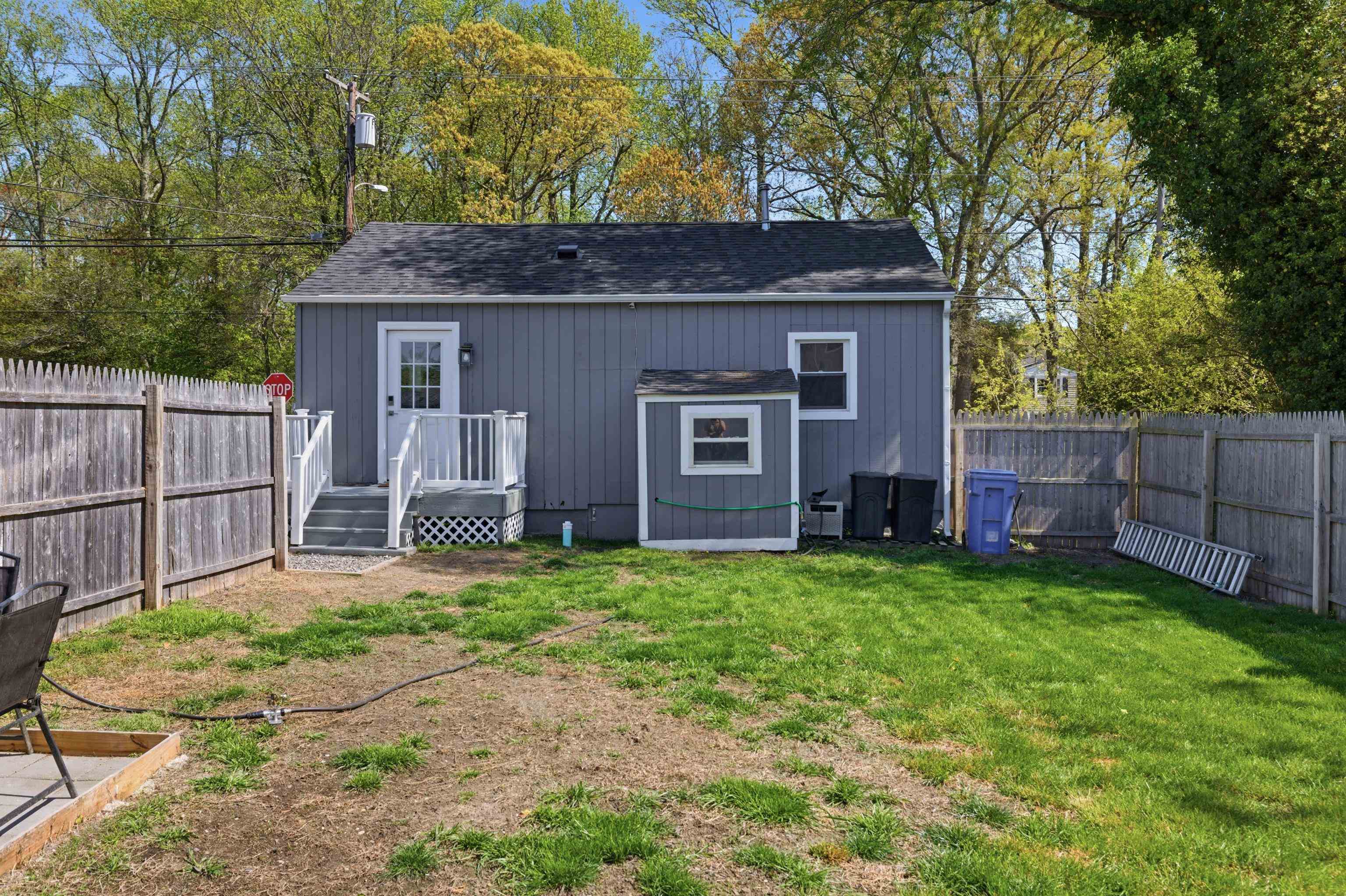209 Breakwater Road North Cape May, NJ 08204 - Photo 29 of 40 a front view of a house with a yard and garage