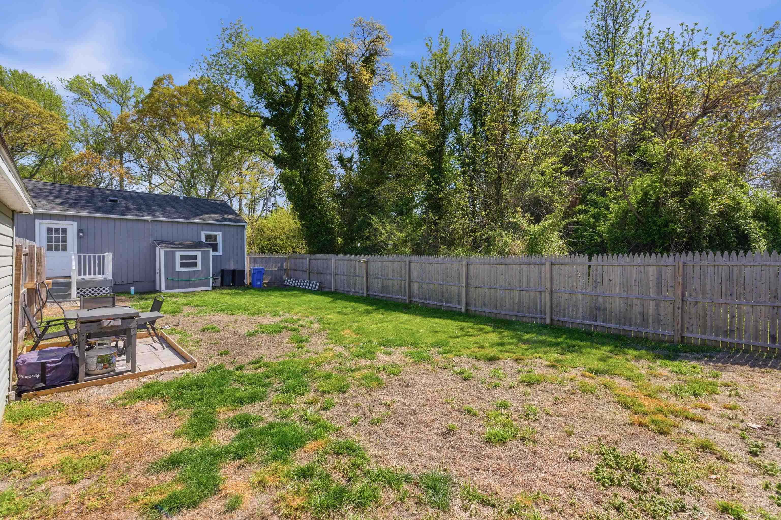 209 Breakwater Road North Cape May, NJ 08204 - Photo 30 of 40 a view of an house with backyard space and sitting area