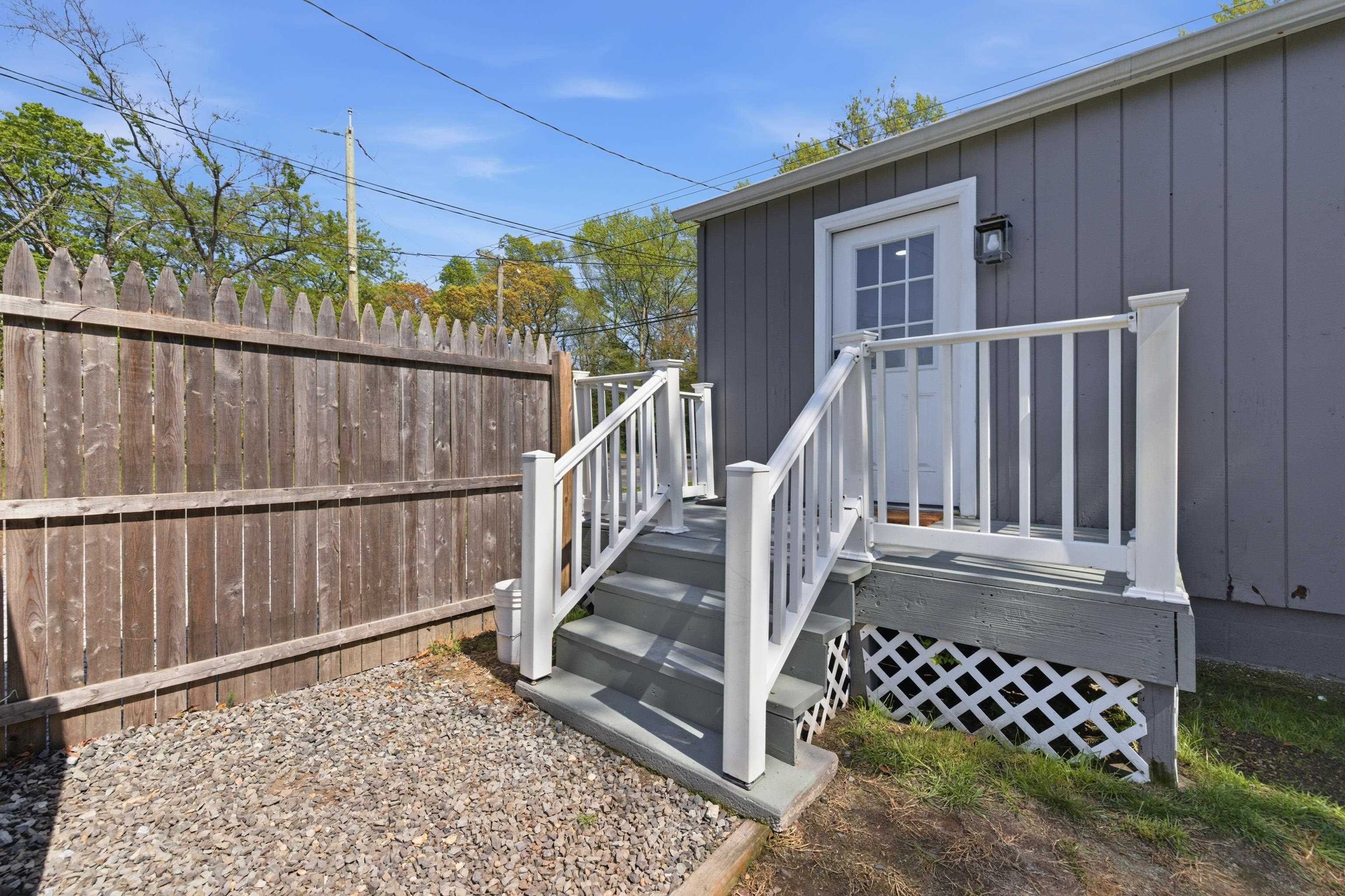 209 Breakwater Road North Cape May, NJ 08204 - Photo 33 of 40 a view of a porch with wooden floor