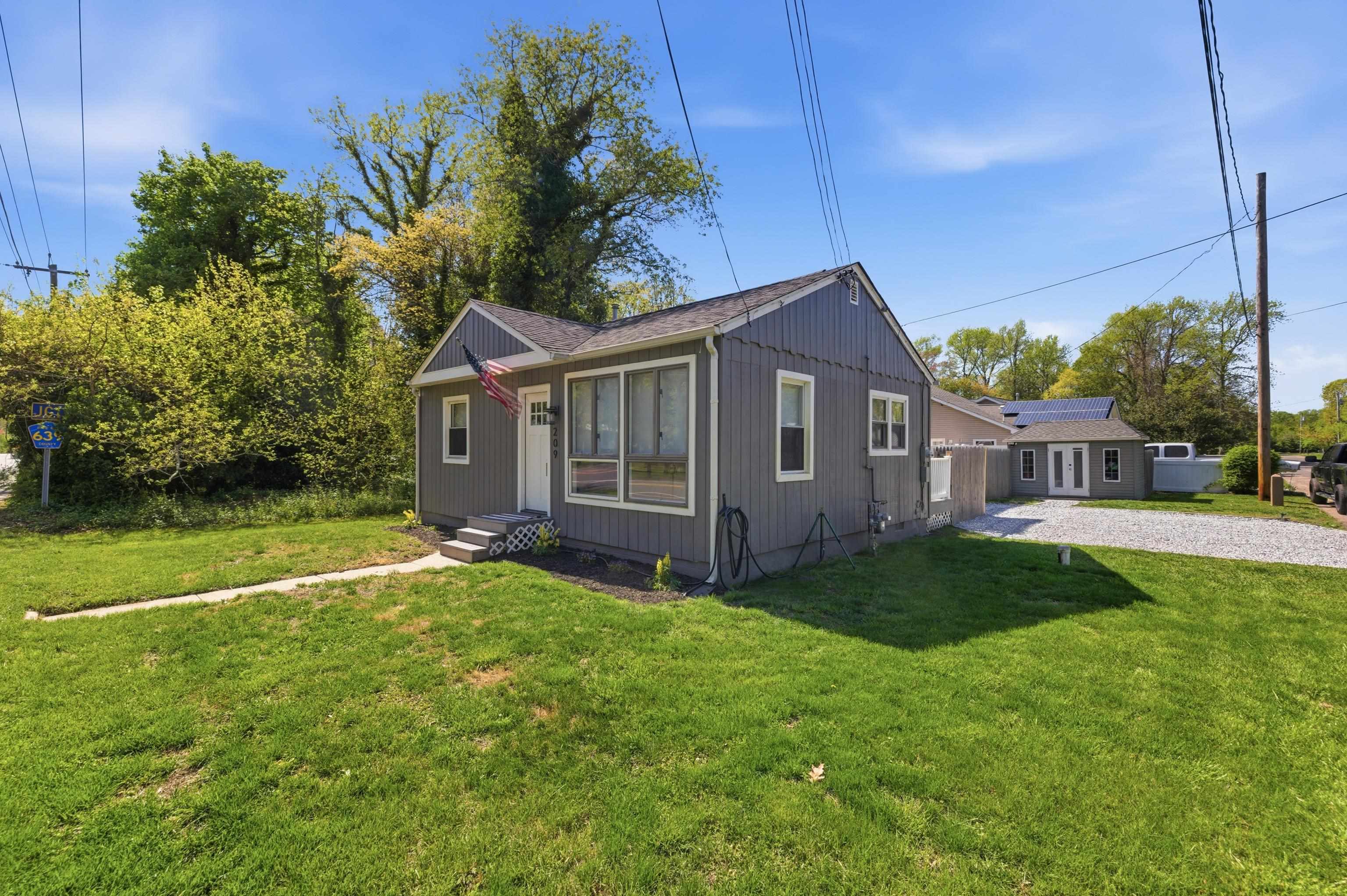 209 Breakwater Road North Cape May, NJ 08204 - Photo 38 of 40 a view of a house with a yard