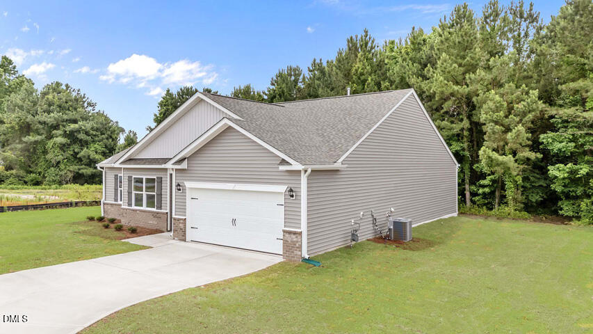 1208 Pavo Path Wendell, NC 27591 - Photo 3 of 31 3-web-or-mls-DJI_20250521103244_0324_D