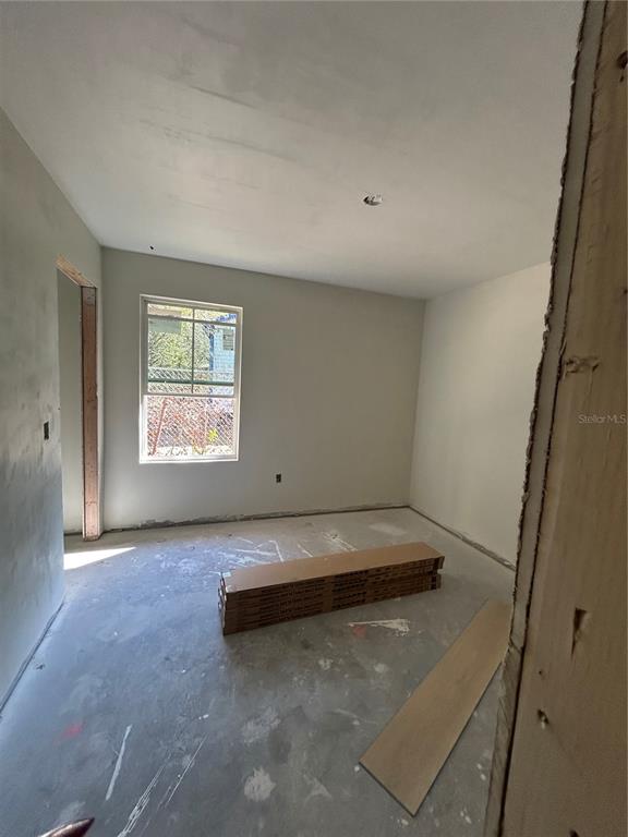 2014 Northeast 3rd Place Gainesville, FL 32641 - Photo 6 of 10 an empty room with windows
