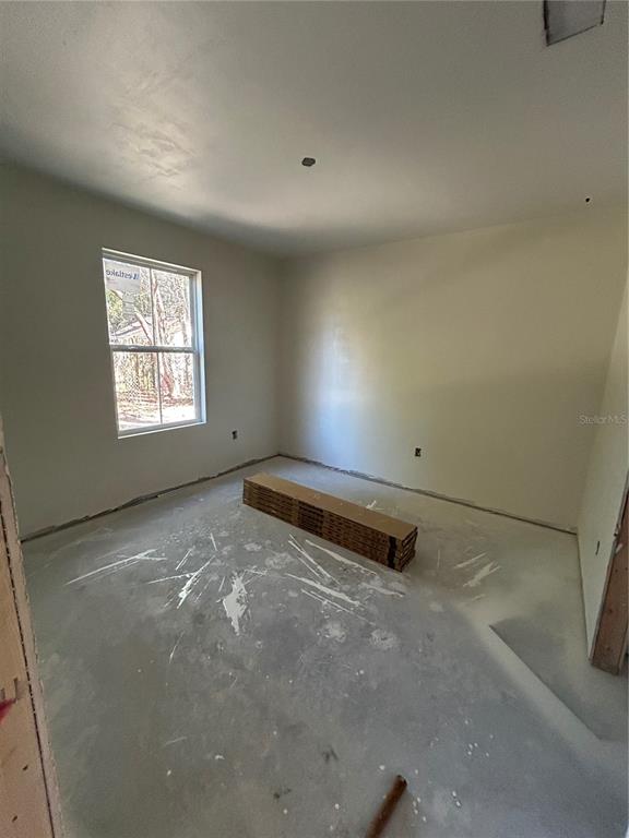 2014 Northeast 3rd Place Gainesville, FL 32641 - Photo 8 of 10 an empty room with windows