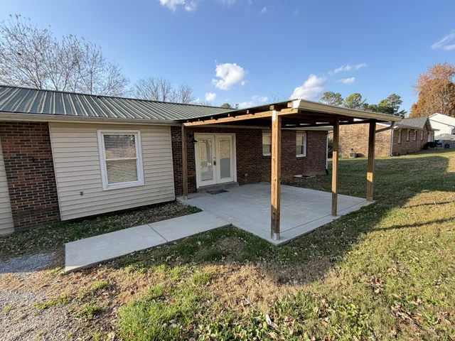 a wooden door in front of a house