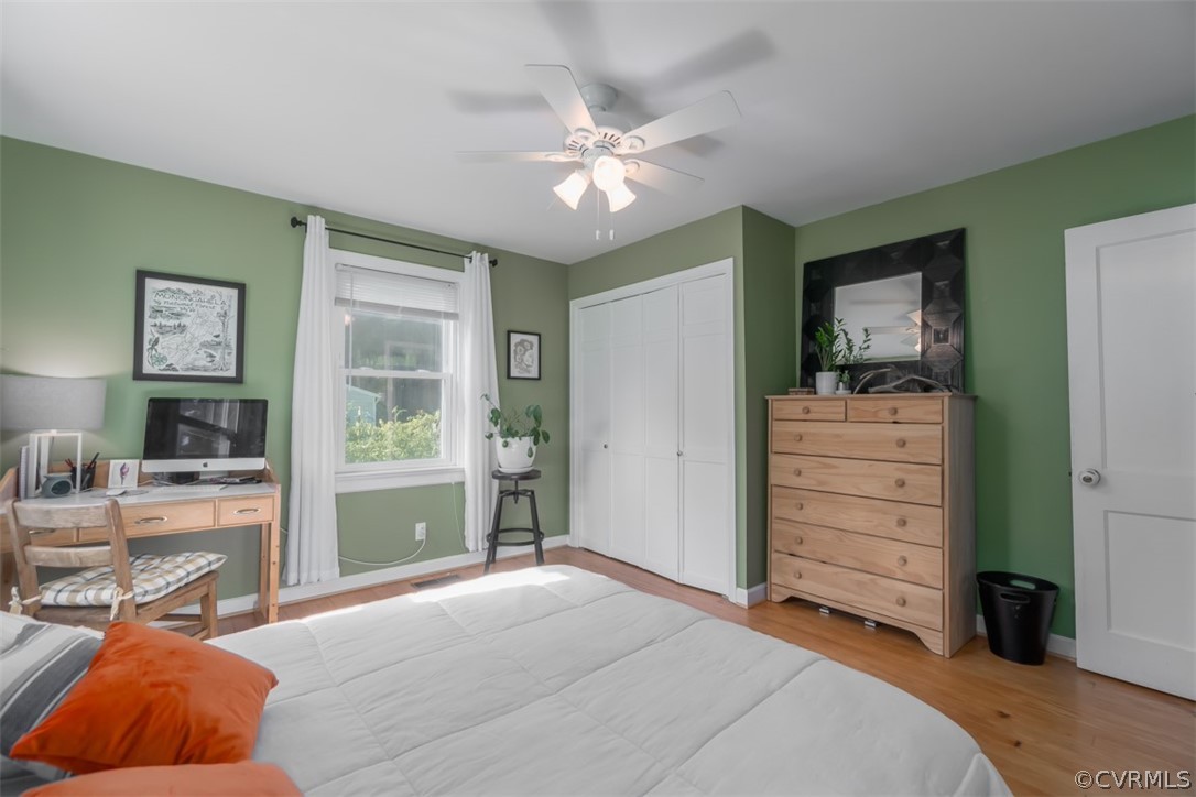 8255 Varina Road Henrico, VA 23231 - Photo 17 of 30 a bedroom with a bed and a chandelier