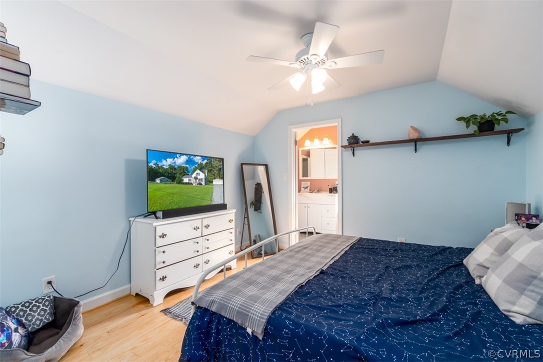 8255 Varina Road Henrico, VA 23231 - Photo 21 of 30 a bedroom with furniture and a flat screen tv