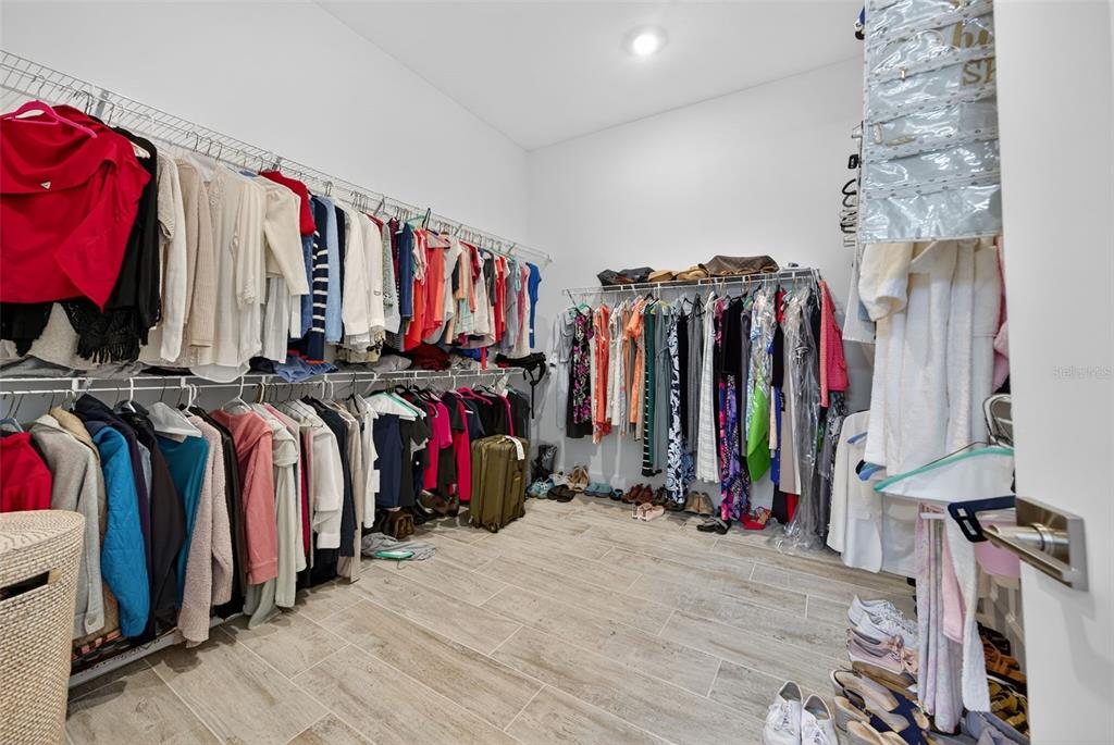 26532 Key Sands Street Englewood, FL 34223 - Photo 43 of 97 a view of walk in closet with clothes