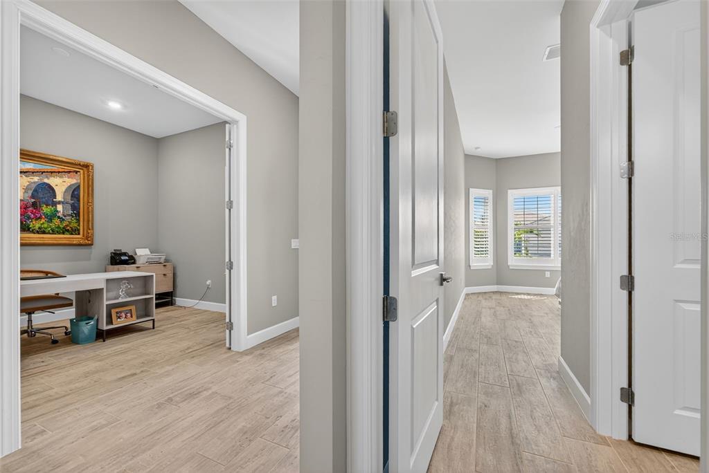 26532 Key Sands Street Englewood, FL 34223 - Photo 46 of 97 a view of a bedroom with furniture and workspace