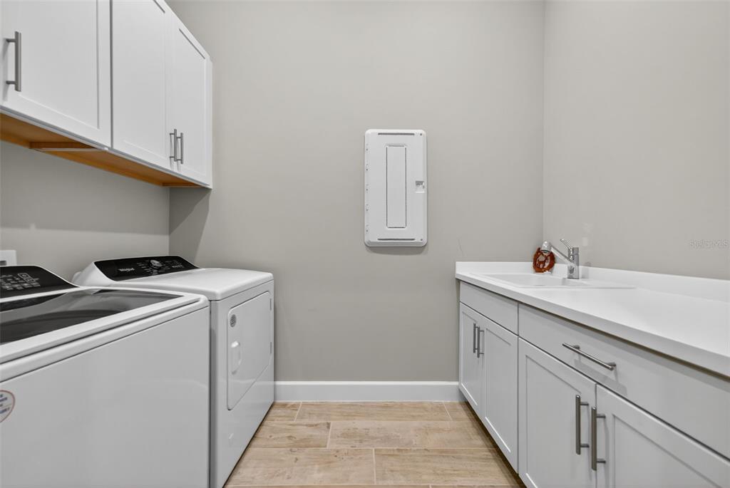 26532 Key Sands Street Englewood, FL 34223 - Photo 56 of 97 a utility room with dryer and washer