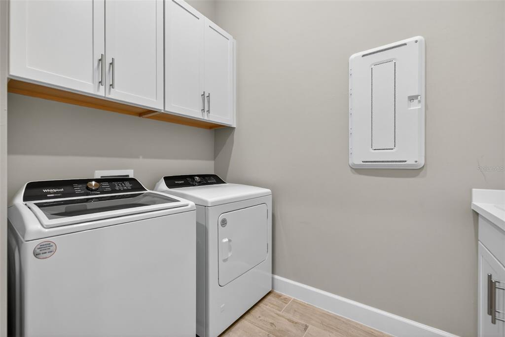 26532 Key Sands Street Englewood, FL 34223 - Photo 57 of 97 a utility room with dryer and washer