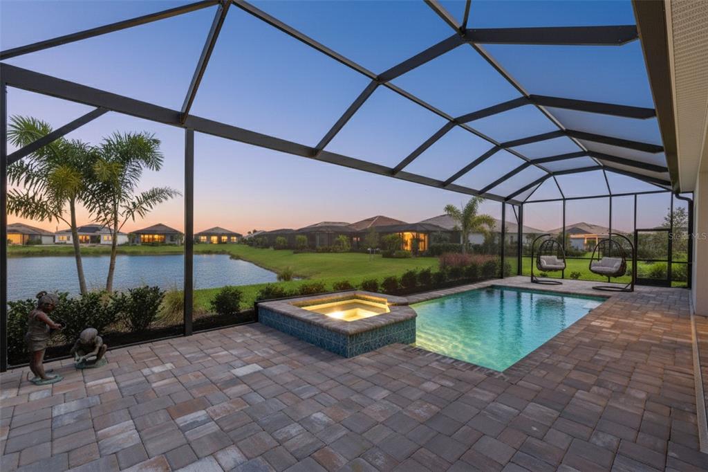26532 Key Sands Street Englewood, FL 34223 - Photo 67 of 97 a view of a swimming pool with a patio