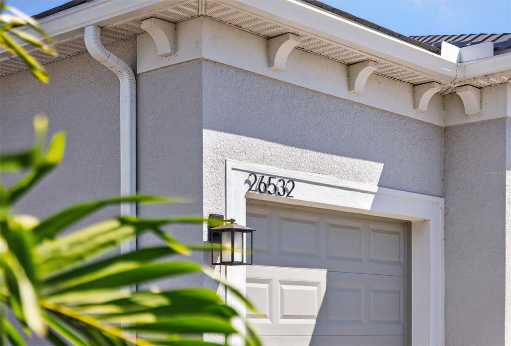 26532 Key Sands Street Englewood, FL 34223 - Photo 7 of 97 a view of a street with a building in the background