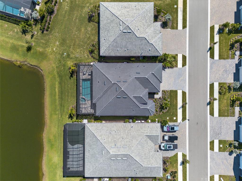 26532 Key Sands Street Englewood, FL 34223 - Photo 78 of 97 an aerial view of a house with a yard