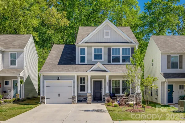 front view of a house with a yard