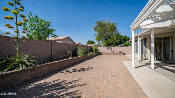 a view of a pathway with a house