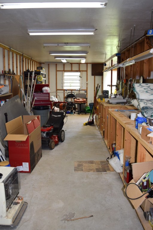 208 Greenfield Road Westminster, SC 29693 - Photo 46 of 50 Interior of Shop Right Side, Work Bench Will Remai