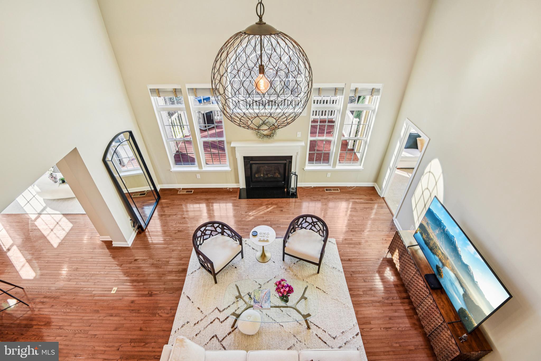 1705 Wolcott Way Hanover, MD 21076 - Photo 16 of 67 a front view of a house with wooden floor and a fireplace