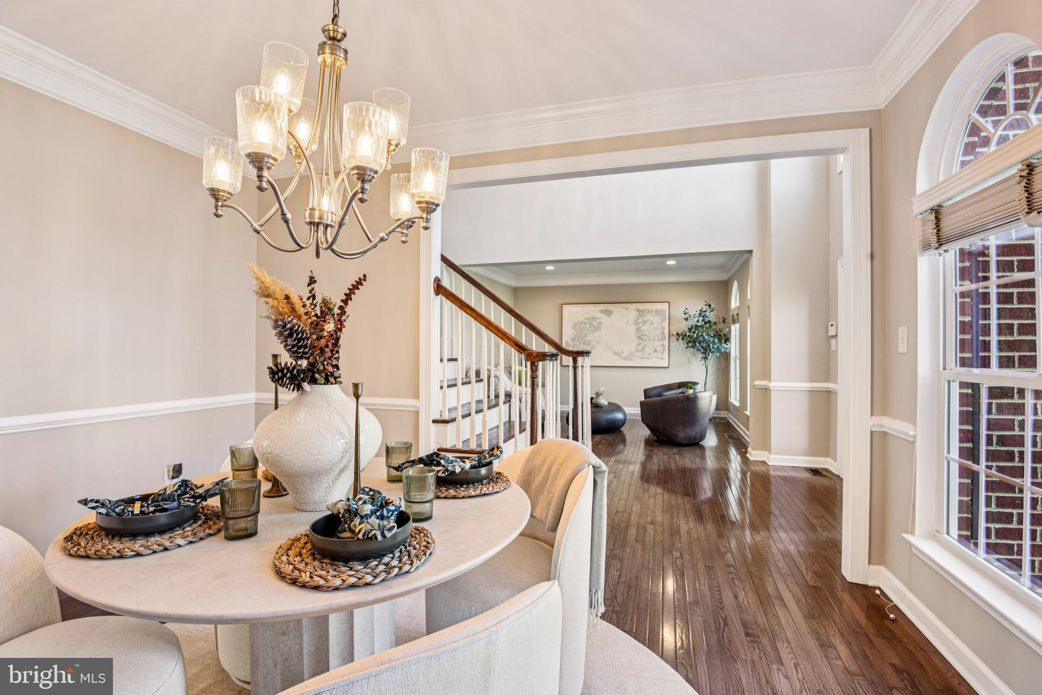 1705 Wolcott Way Hanover, MD 21076 - Photo 18 of 67 a living room with furniture and a chandelier