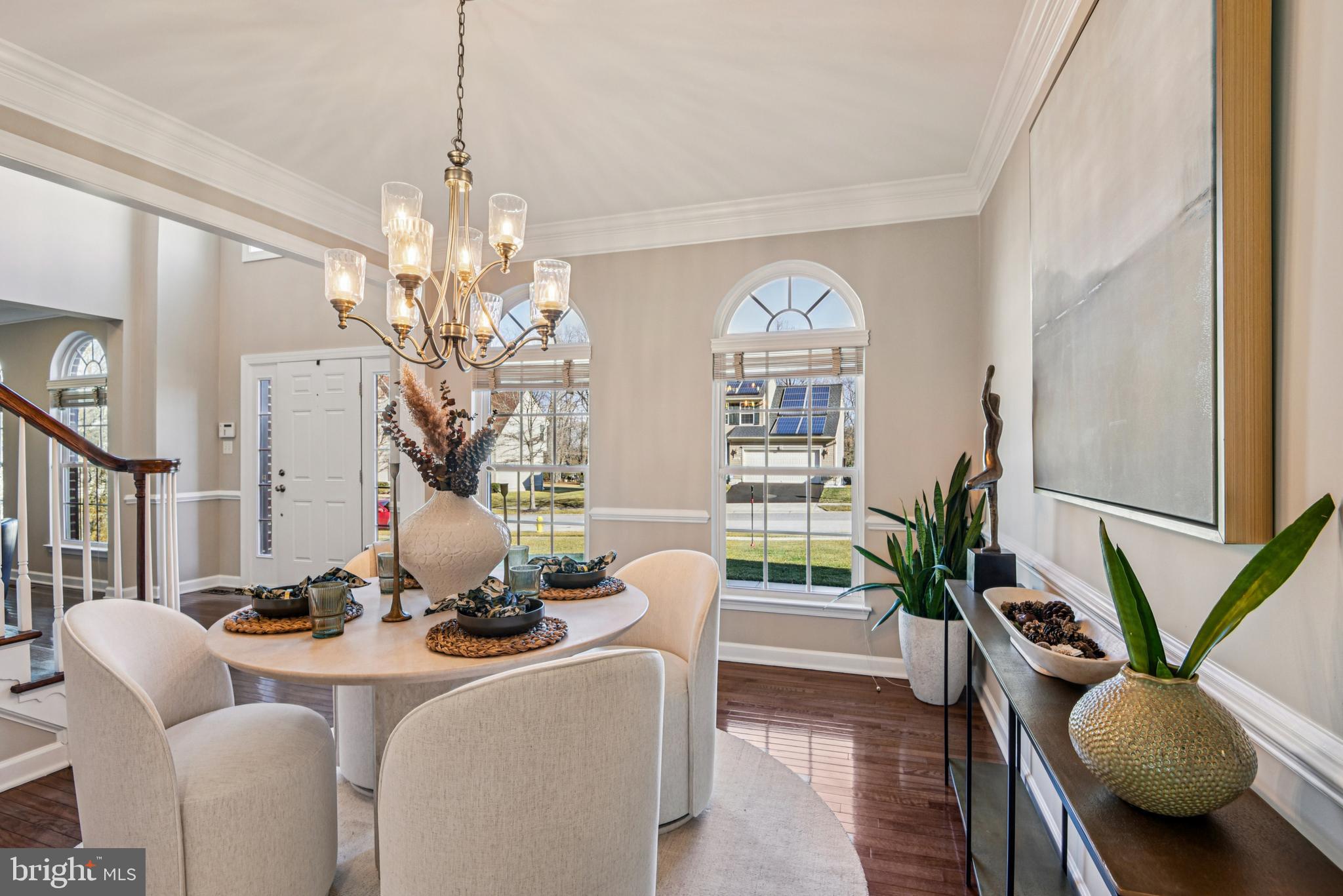 1705 Wolcott Way Hanover, MD 21076 - Photo 20 of 67 a living room with furniture a chandelier and a chandelier
