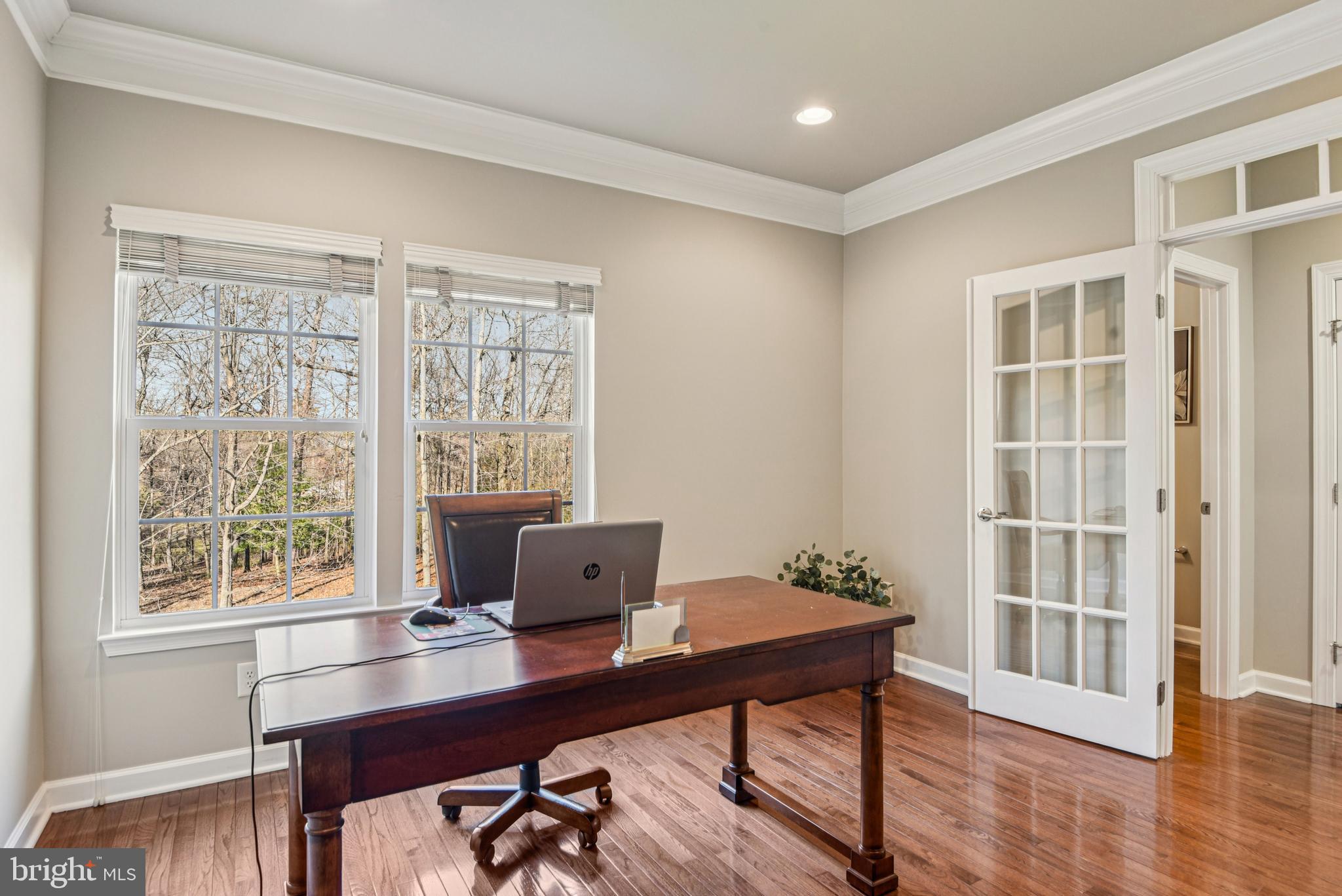 1705 Wolcott Way Hanover, MD 21076 - Photo 29 of 67 a workspace with furniture and wooden floor