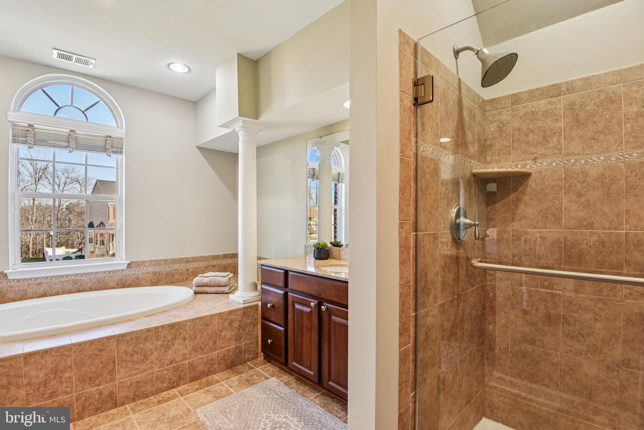 1705 Wolcott Way Hanover, MD 21076 - Photo 40 of 67 a bathroom with a bathtub and a shower