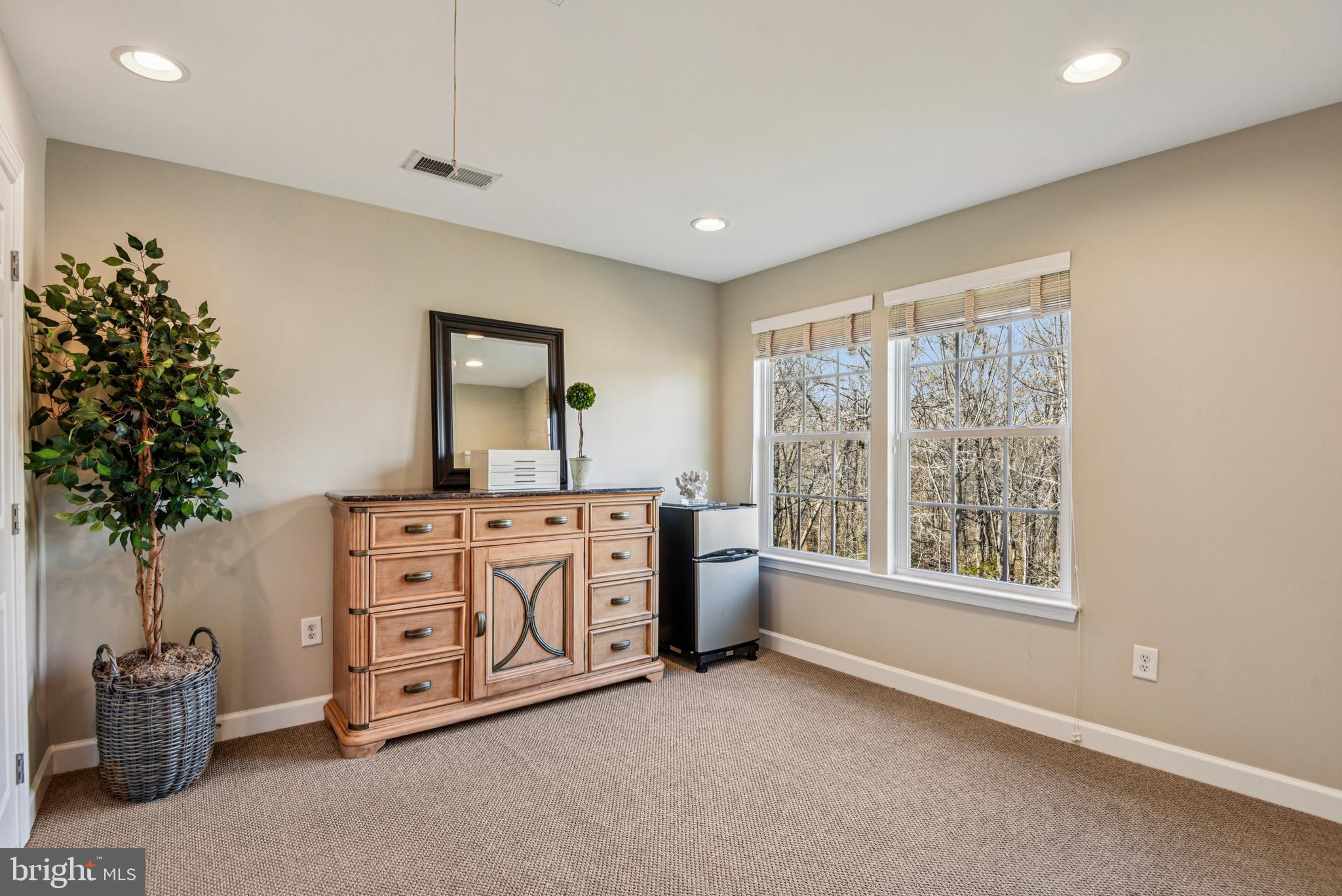 1705 Wolcott Way Hanover, MD 21076 - Photo 44 of 67 a spacious bedroom with a large bed and a window