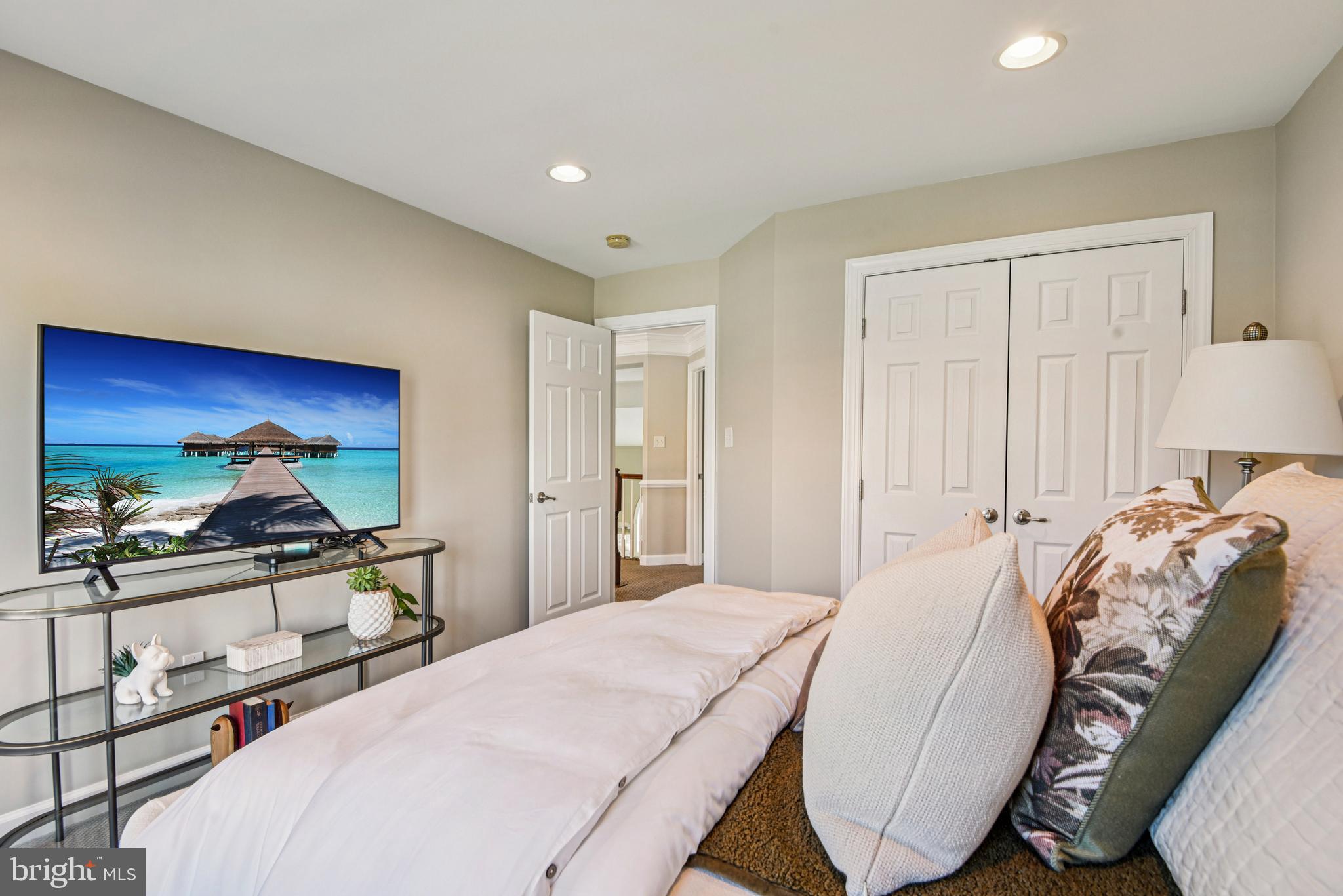 1705 Wolcott Way Hanover, MD 21076 - Photo 48 of 67 a bedroom with a bed and a flat screen tv