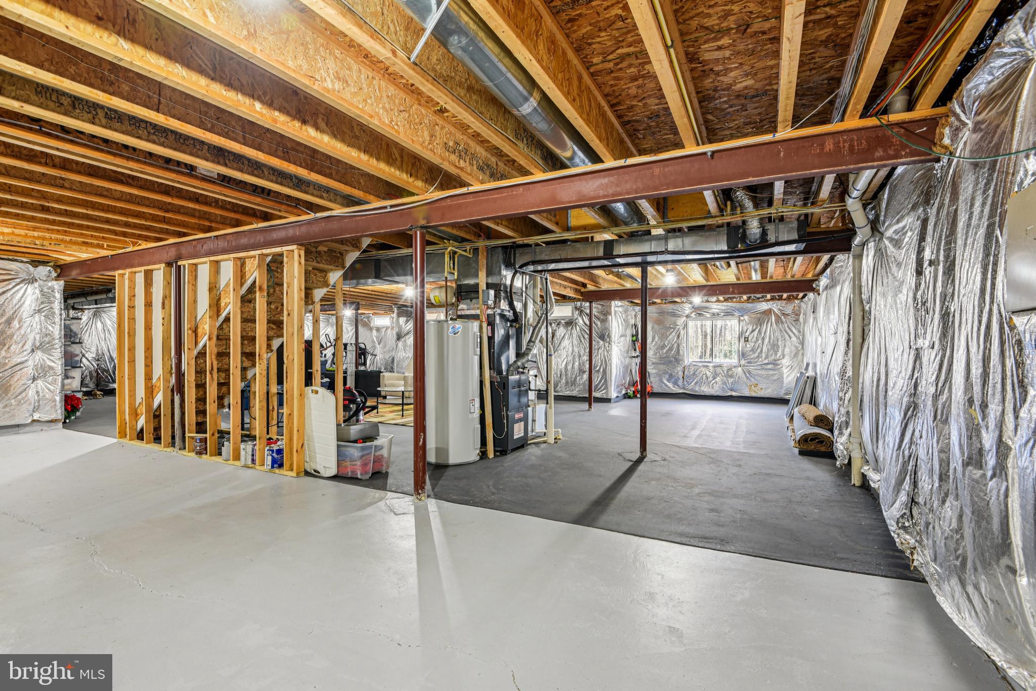 1705 Wolcott Way Hanover, MD 21076 - Photo 56 of 67 a view of an empty room with wooden floor