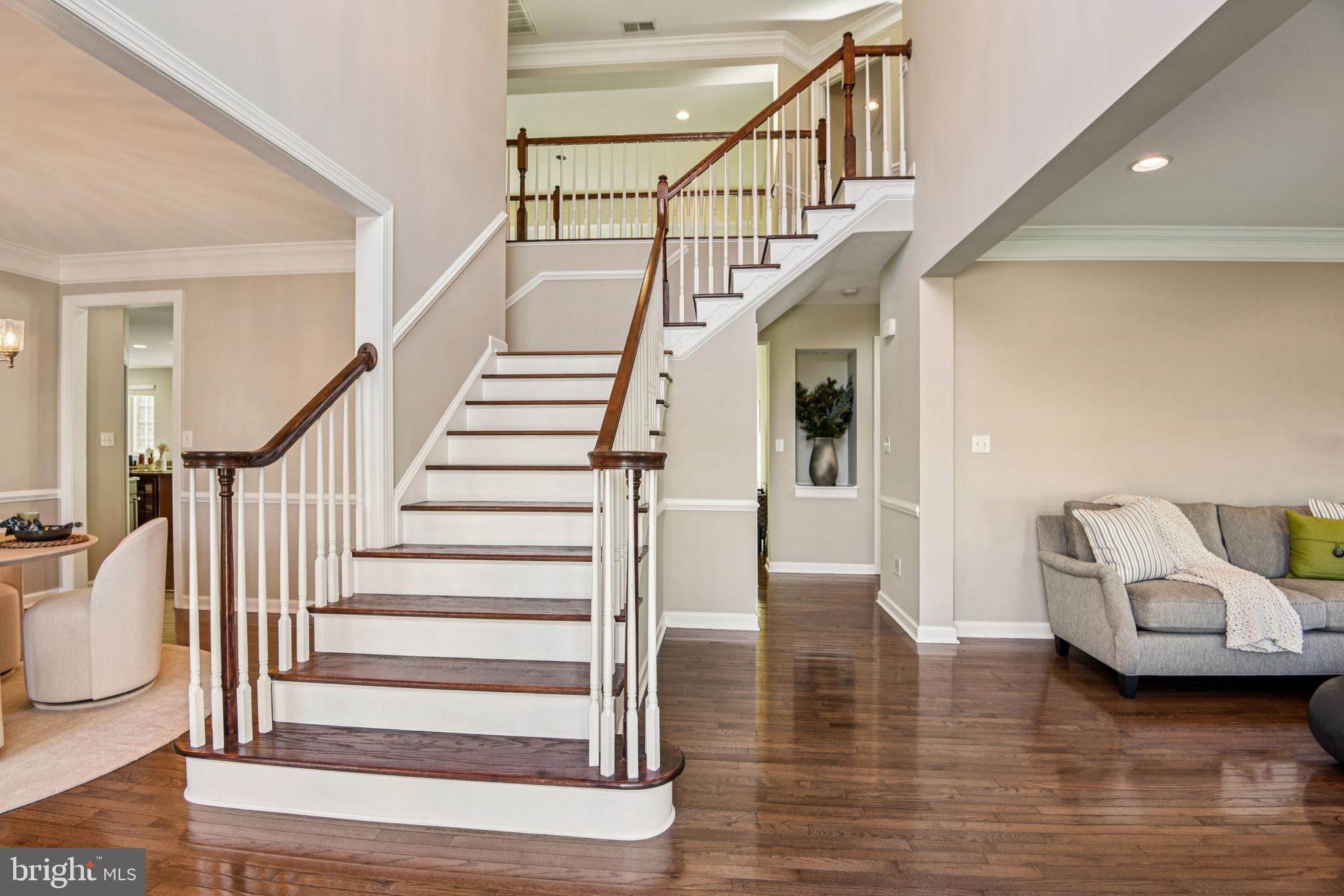 1705 Wolcott Way Hanover, MD 21076 - Photo 6 of 67 a view of entryway and hall with wooden floor